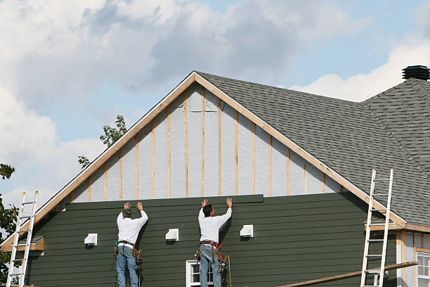 Professional Siding Replacement technician working in Greensburg, KY